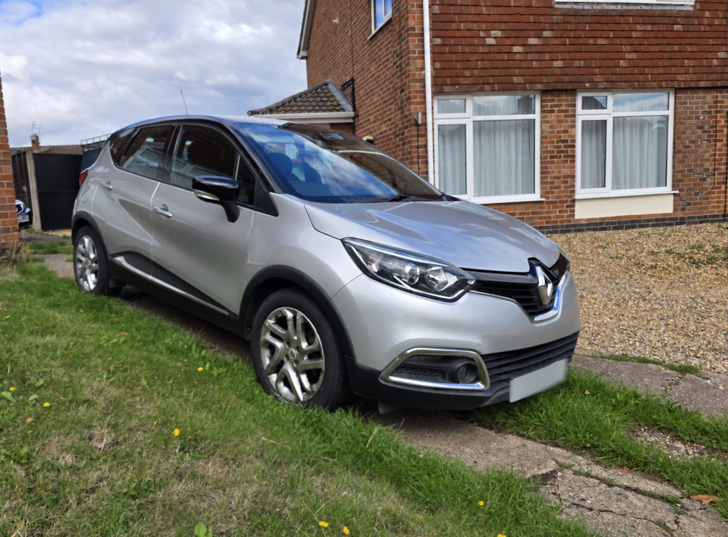 Genuine silver Renault Captur photographed as a real-world used-car buying example