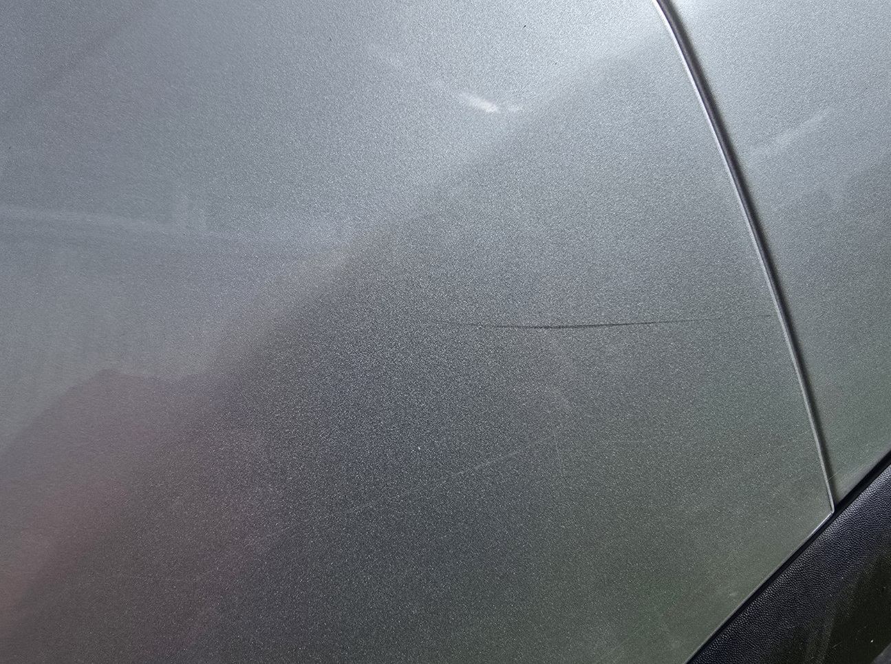 Close-up of a paint scratch on a Renault Captur