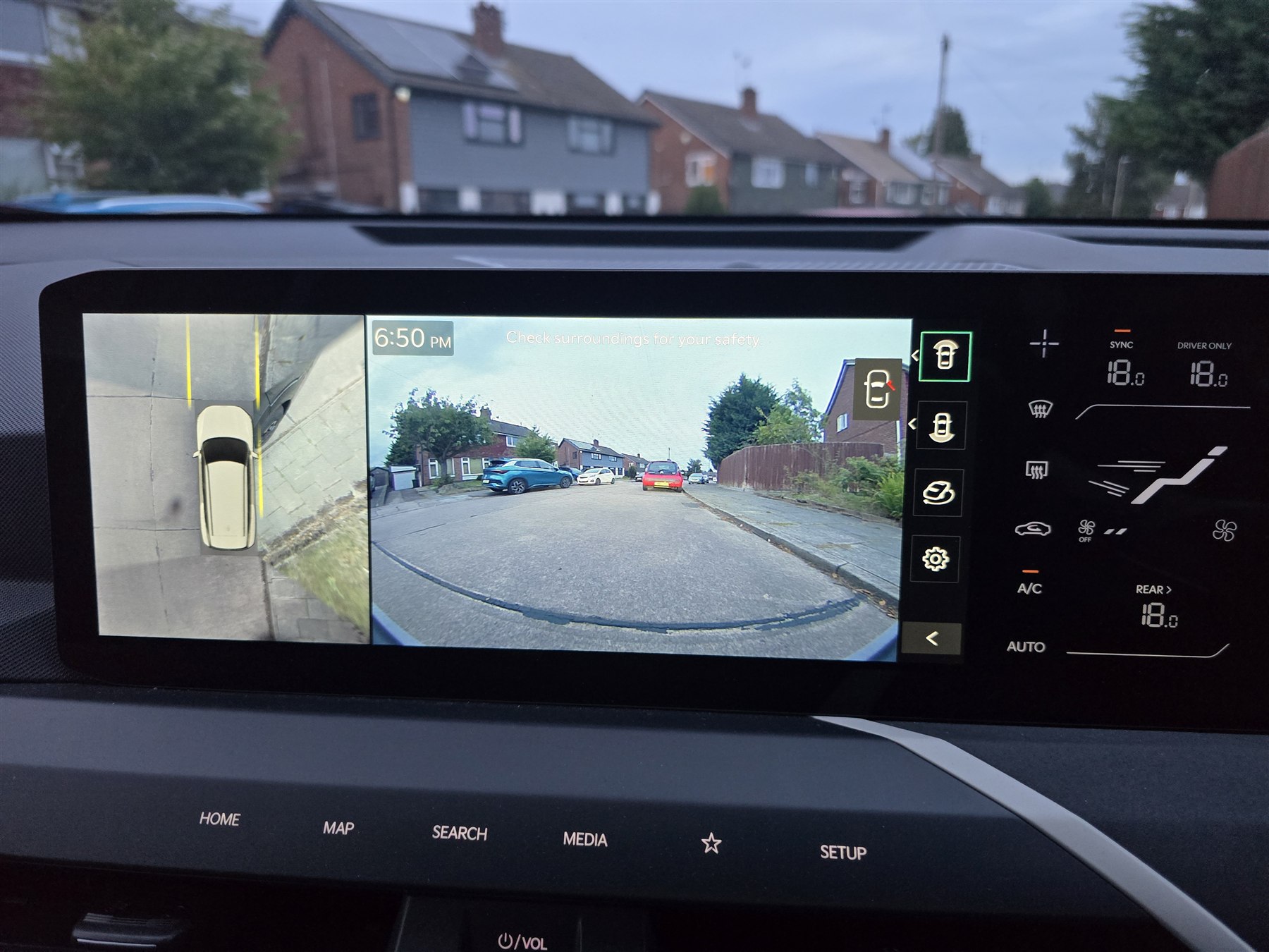 360-degree parking camera display during an equipment check.