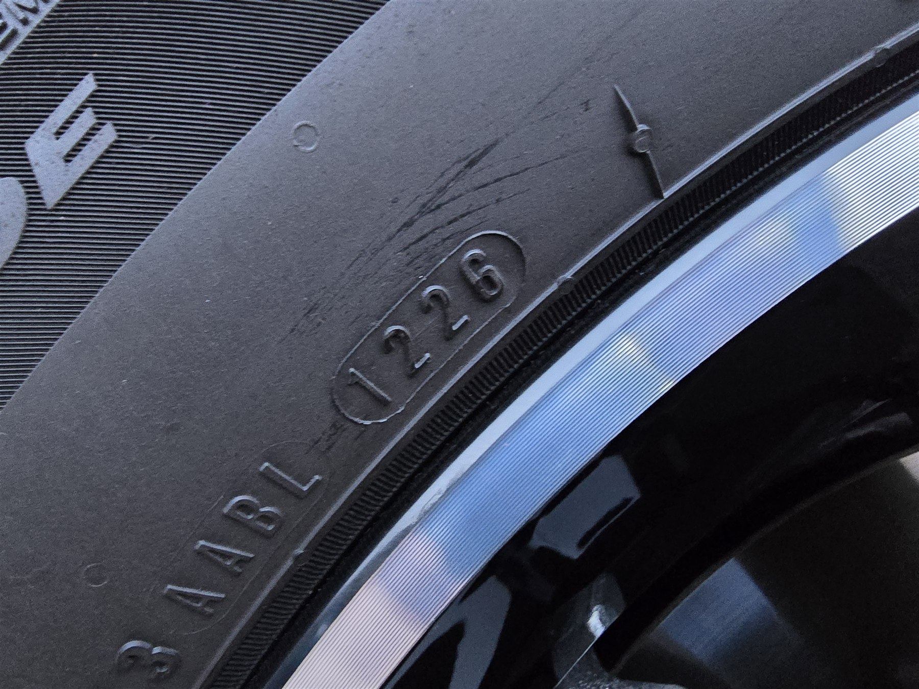 Tyre sidewall markings showing where age information can be found.