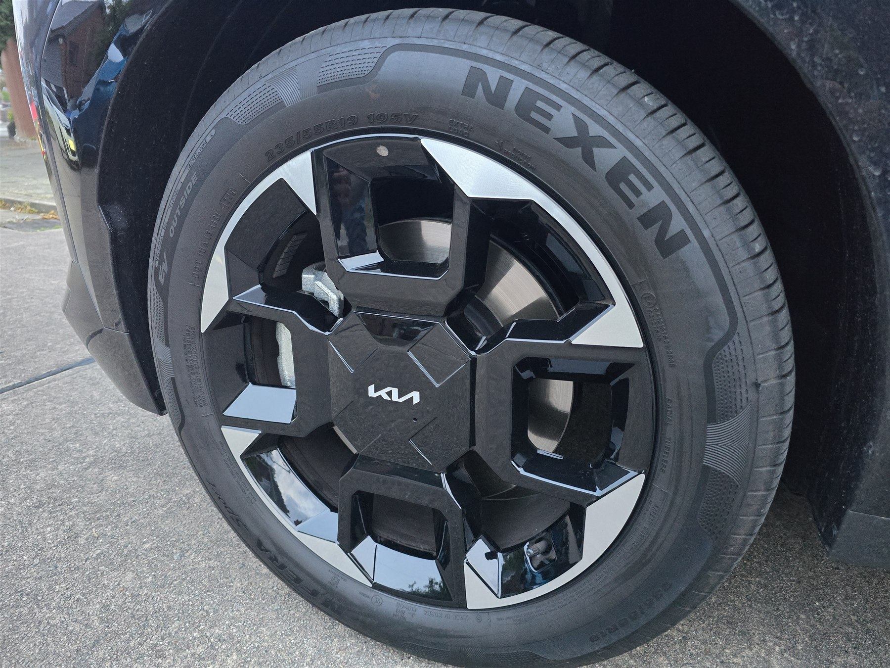 Modern alloy wheel and tyre viewed during a routine condition check.