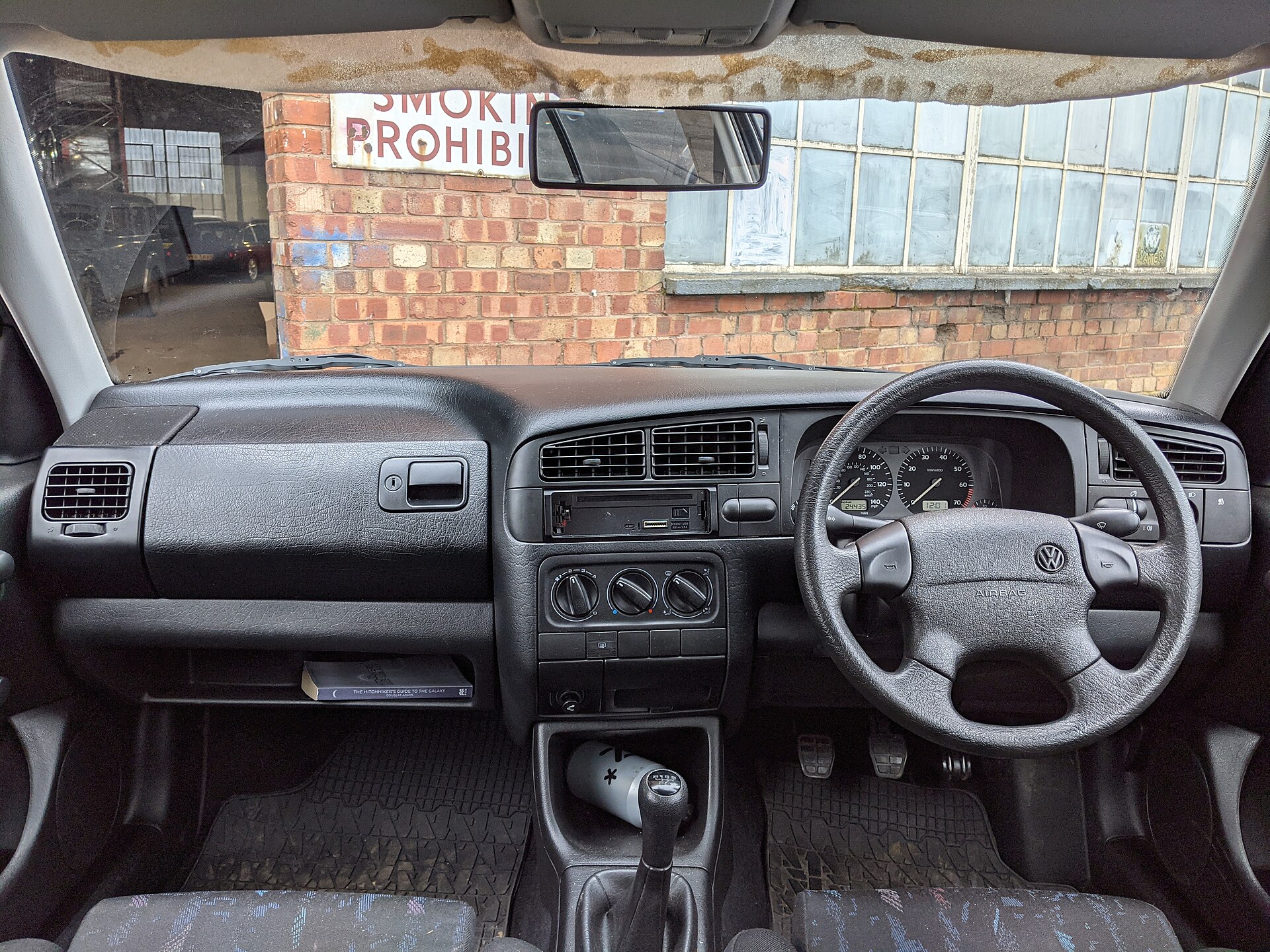 Right-hand-drive Volkswagen Golf Mk3 GTI dashboard, steering wheel and front cabin