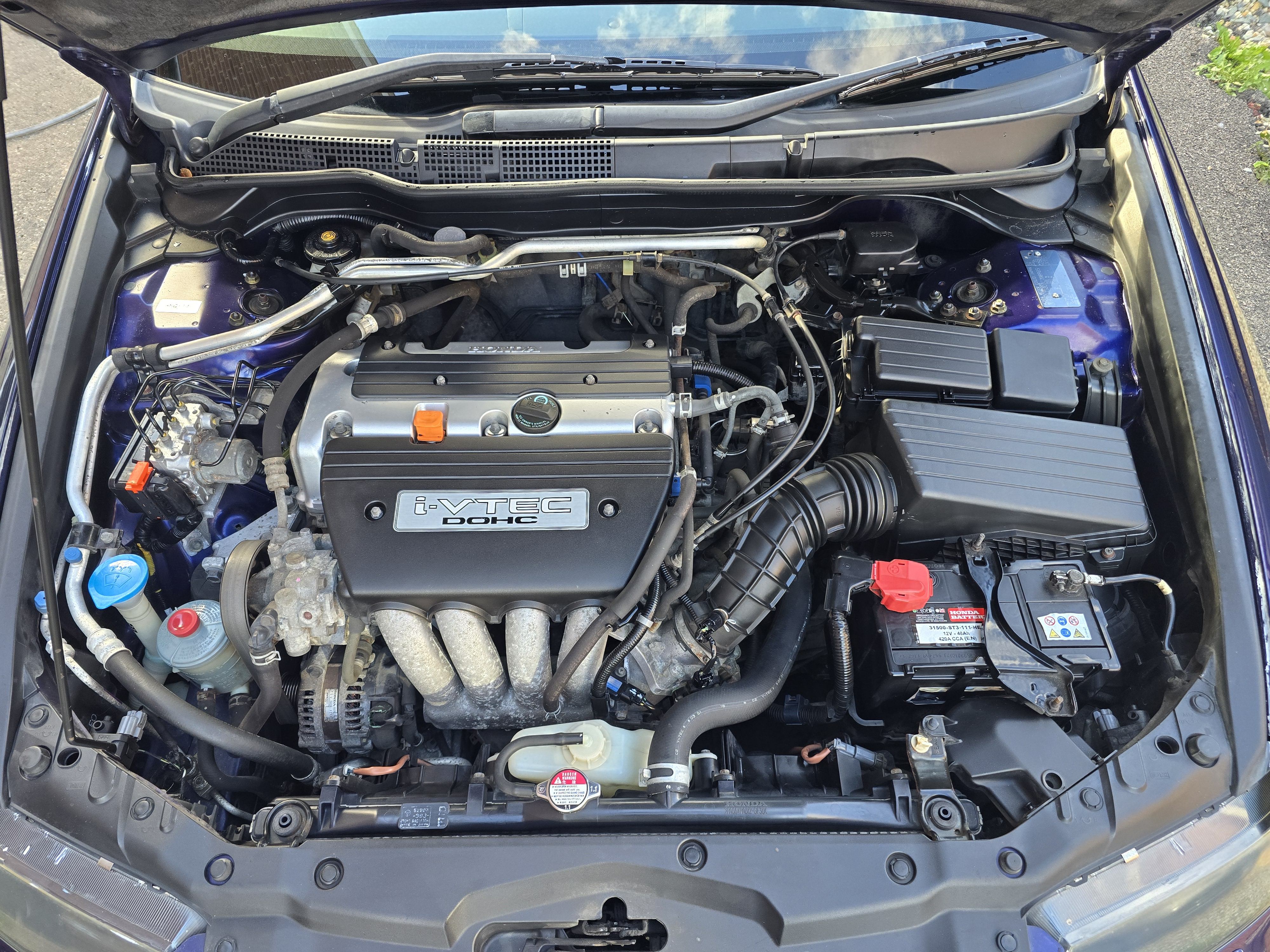 The same 2003 Honda Accord engine bay after careful controlled cleaning and presentation