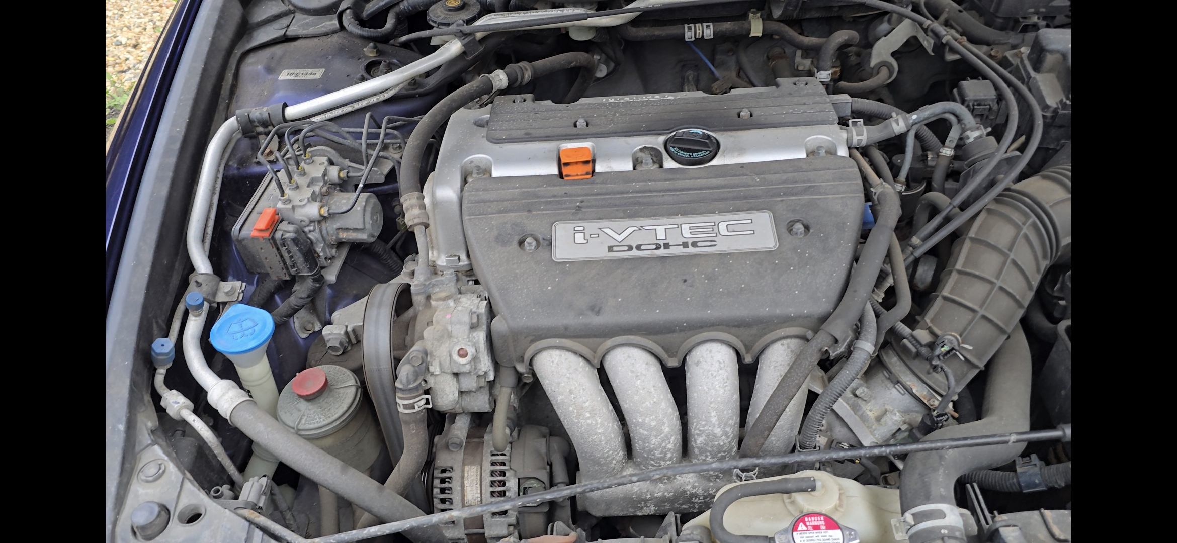 Dirty 2003 Honda Accord engine bay before careful cleaning and presentation