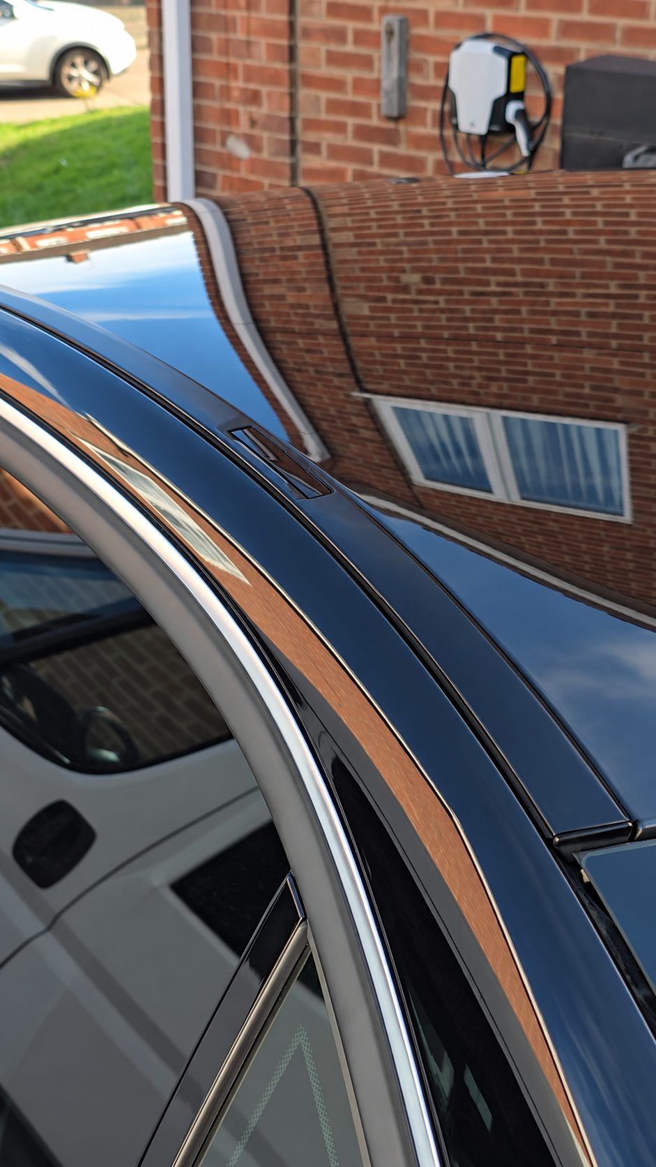 Mercedes-Benz W204 black roof-gutter trim refinished and refitted